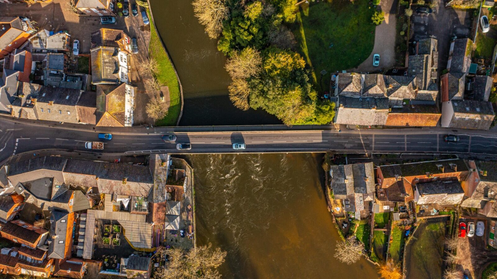 Aerial photo from a drone of the medieval road bridge in Fordingbridge that spans over the river.
