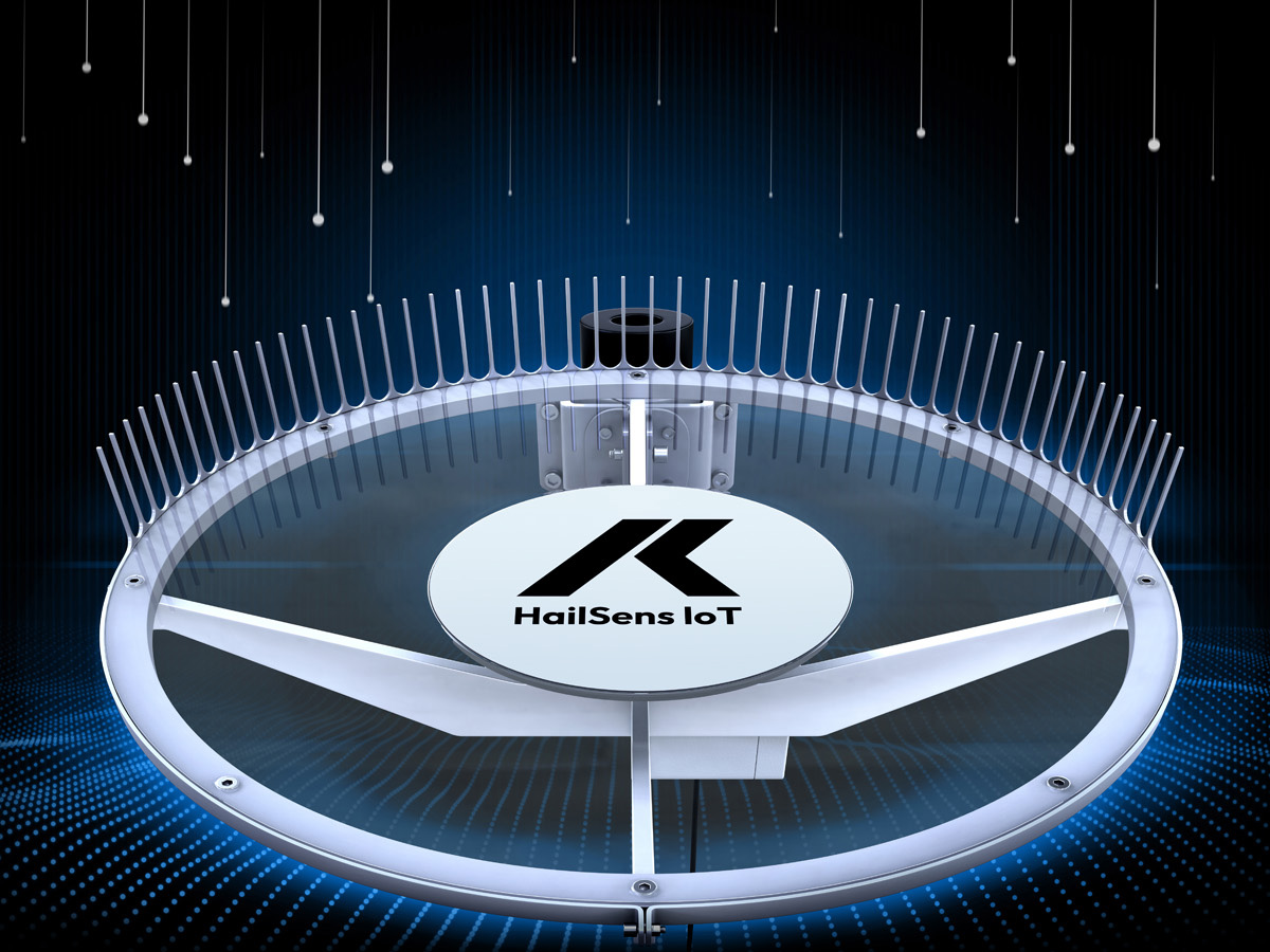 A circular electronic device labeled HailSens IoT, featuring metal spikes around its edge, acts as a real-time hail sensor, set against a dark blue digital background with glowing lines and dots.