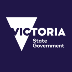 Logo of the Victoria State Government featuring a white triangle pointing downwards, with the word VICTORIA partially inside it, State Government written underneath, and highlighting Hydstra – Environmental Data Management on a dark blue background.