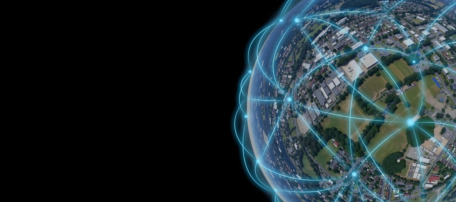 A digital illustration of a globe showing a cityscape with glowing blue network lines crisscrossing over it, symbolizing global connectivity, on a black background with empty space on the left.