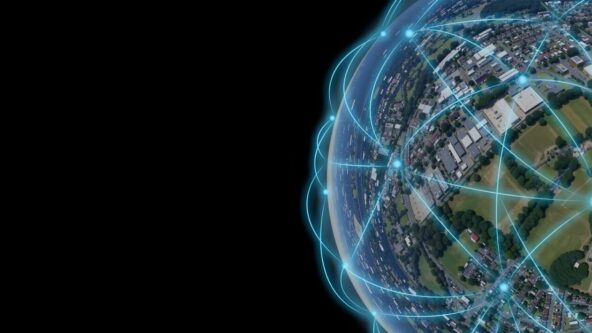 A digital illustration of a globe showing a cityscape with glowing blue network lines crisscrossing over it, symbolizing global connectivity, on a black background with empty space on the left.